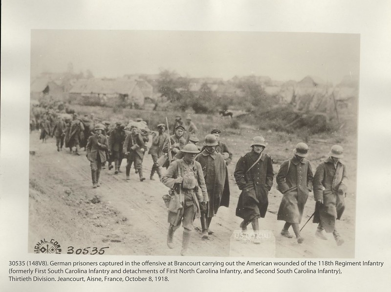 POWView of German prisoners captured in the offensive at Brancourt, France, carrying out the American wounded of the 118th Infantry Regiment, 30th Division.jpg