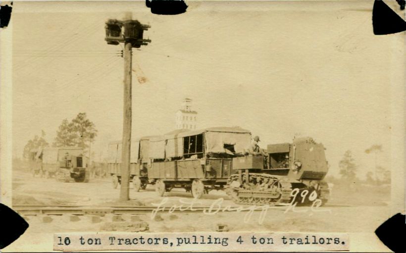 Real-photo postcard of a photograph of U.S. Army 10-ton tractors pulling 4-ton trailers at Fort Bragg, N.C., around the 1920s [circa 1920s]